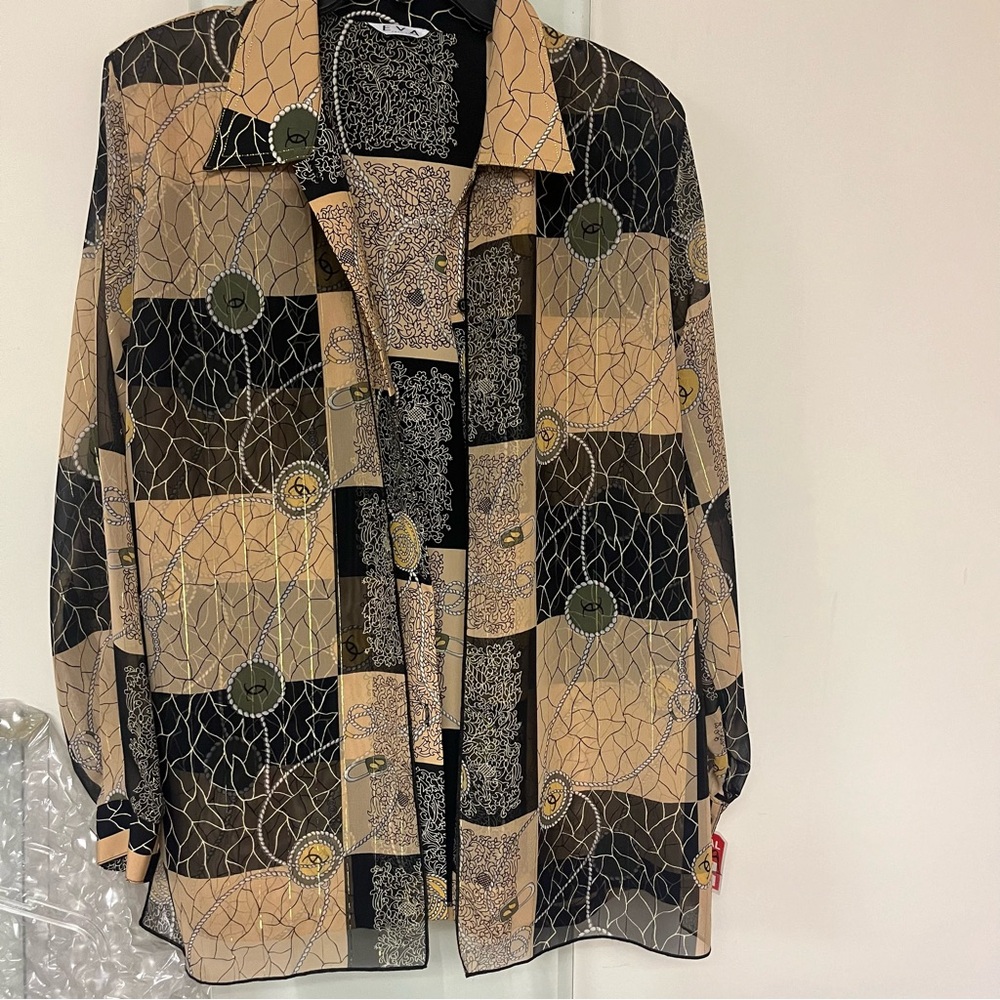 Brand new light fancy jacket for women. Sheer sleeves,